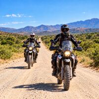 Motorcyclists on a gravel road in Namibia